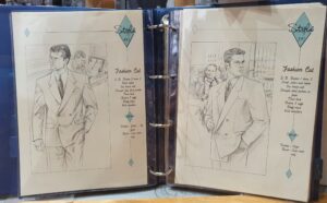 Blue binder folder with two pages, each showing sketches and details of a Burton made-to-measure suits