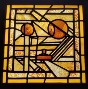 Orange and yellow square stained glass panel