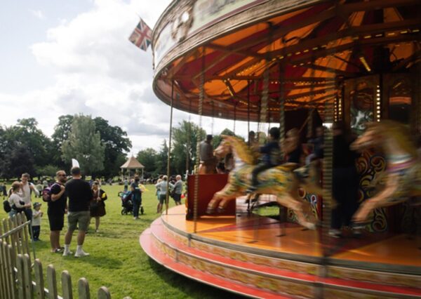 Chippenham-Town-Council-JCP100-17 Photograph of a carousel with people around it