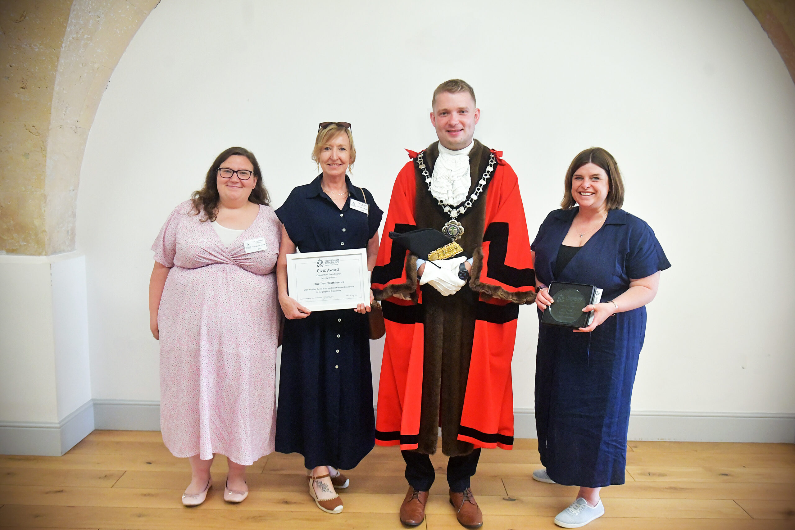 Rise Youth Service Civic Award 2024 Photograph of 4 people including the mayor and someone winning a civic award