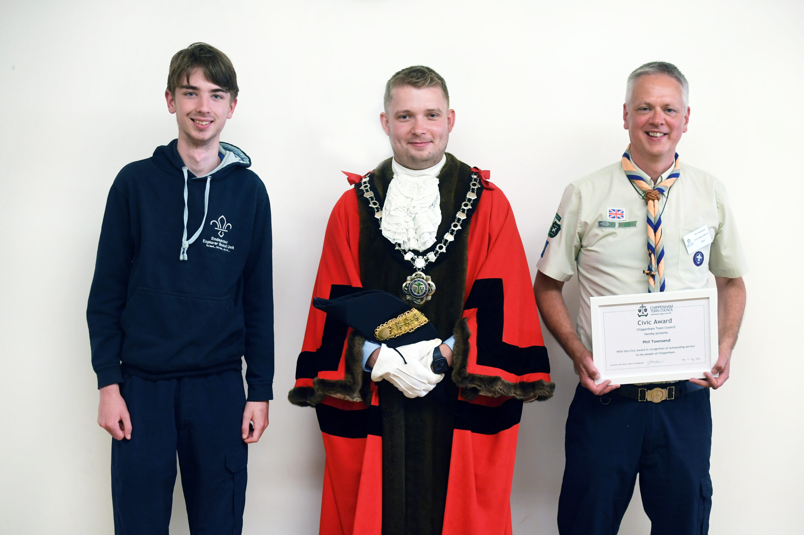 Phil Townsend Civic Award 2024 Photograph of 3 people including the mayor and someone winning a civic award