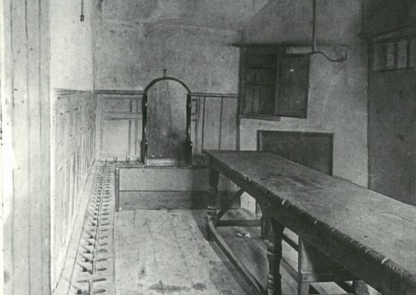 A Chartered Town 2 Black and white vintage photograph of room with table