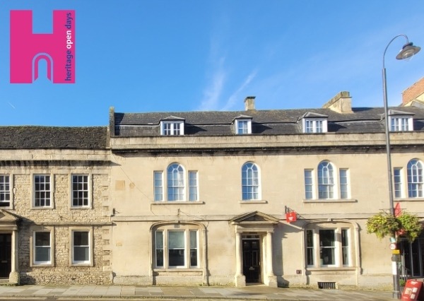 A picture of the front exterior of Chippenham Museum, comprised of two Grade II listed Georgian townhouses.